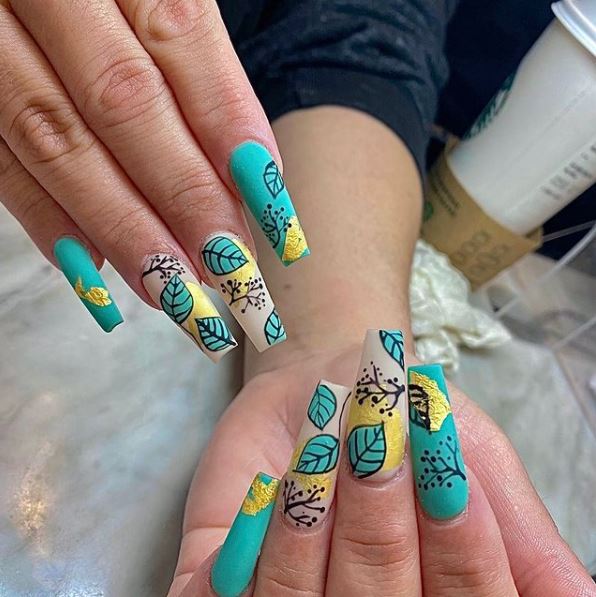 Leaf green and yellow nail design