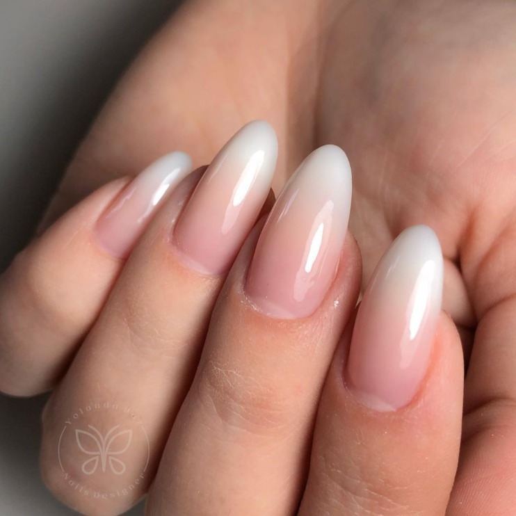 These ombre nails are great because the white tip and pink base go... 