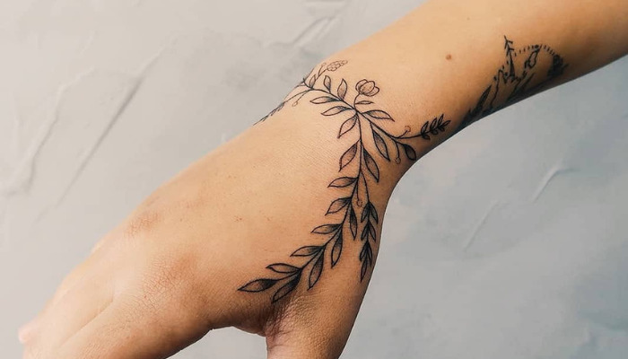 wrist tattoos that wrap around Web